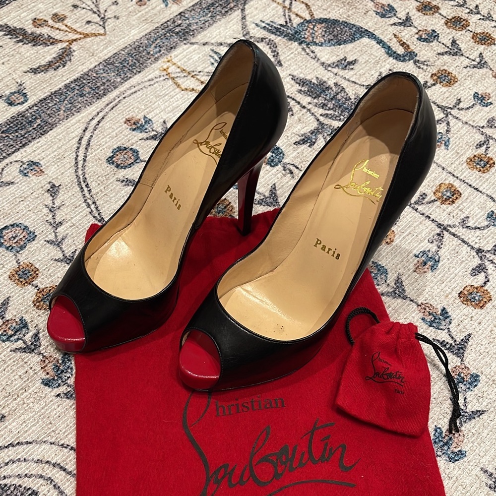 Christian Louboutin peep toe pumps